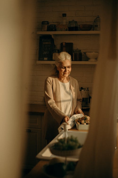 Old woman in a kitchen