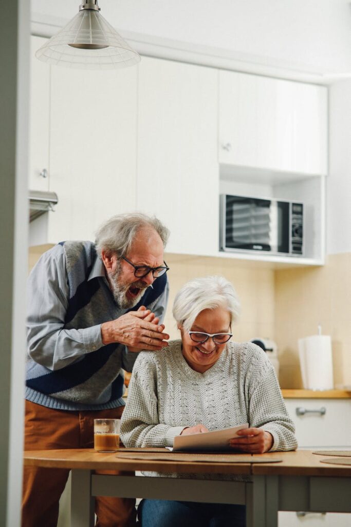 Old man and woman laughing