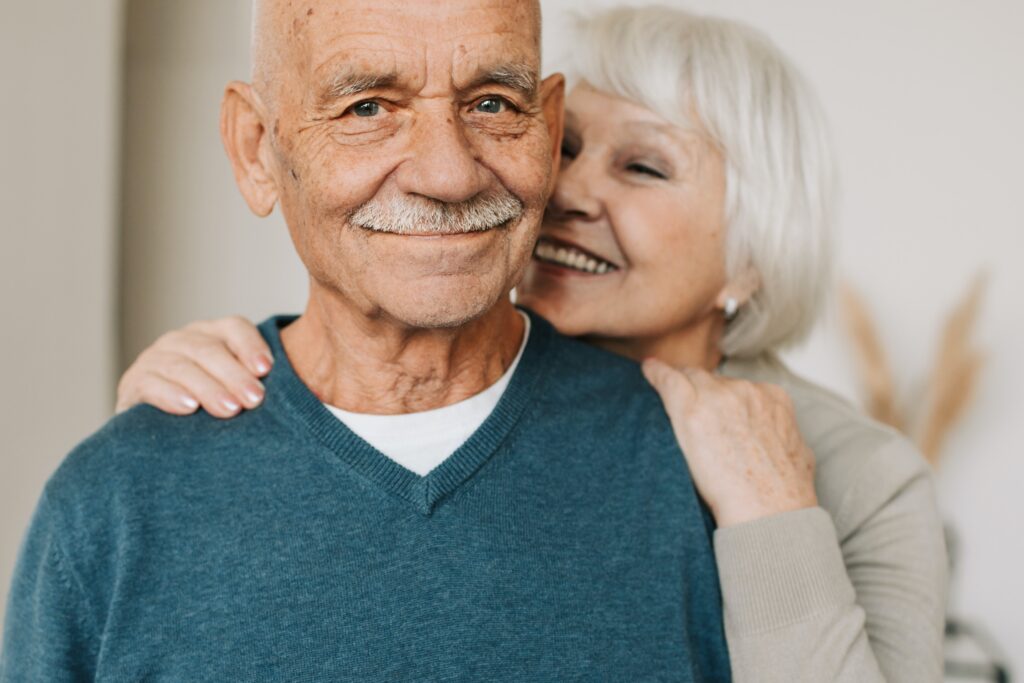 happy elderly man woman